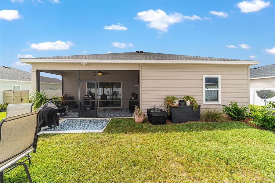 Exterior details and patio area of a home in Country Lane Estates, Williston (Image 26).