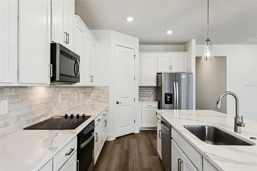 Furnished interior view inside a new home in Ridgehaven - Signature Series, Ormond Beach (Image 6).