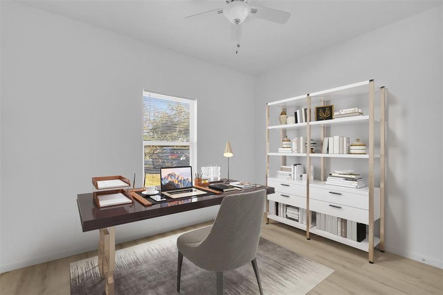 Office featuring light wood-style floors and a ceiling fan