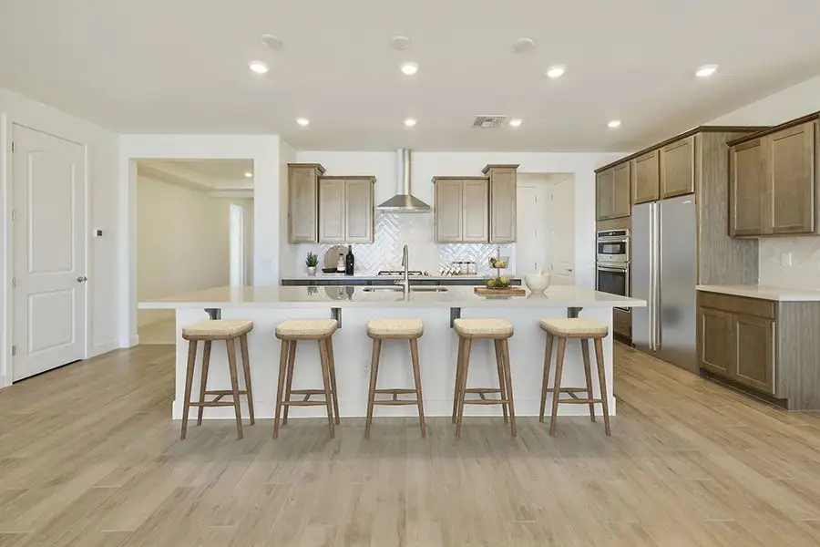 Furnished interior view inside a new home in Windrose V, Waddell (Image 3).