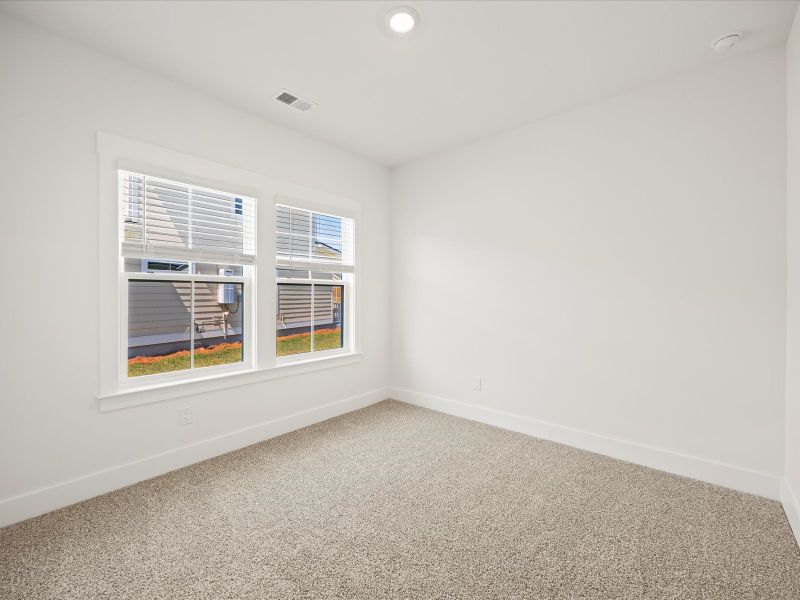 Spacious, unfurnished interior of a new home in The Coves at Lakes of Cane Bay II, Summerville (Image 26). Spacious, unfurnished interior of a new home in The Coves at Lakes of Cane Bay II, Summerville (Image 26).