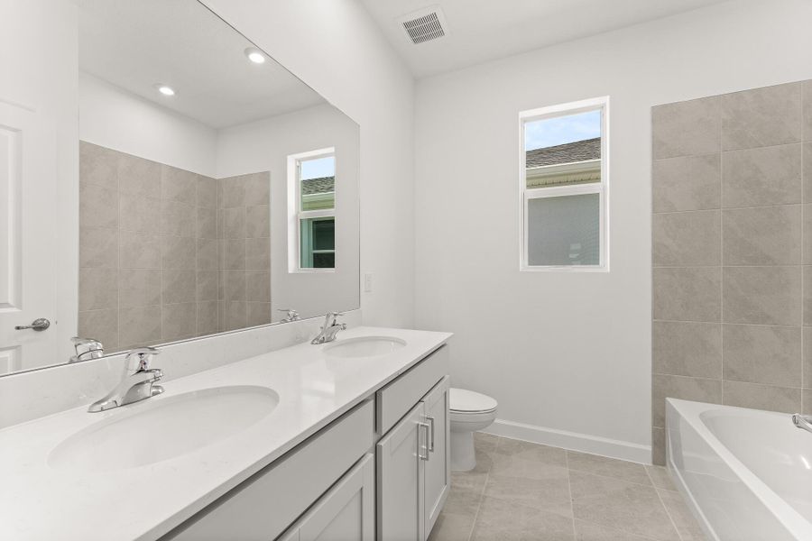 Furnished interior view inside a new home in Tradition - Cadence, Port St. Lucie (Image 3). Furnished interior view inside a new home in Tradition - Cadence, Port St. Lucie (Image 3).