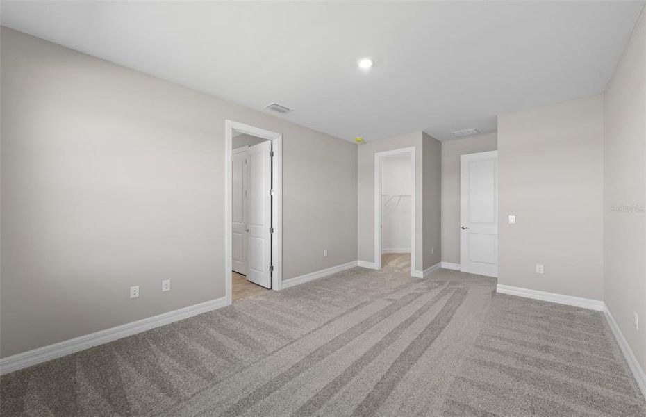 Spacious, unfurnished interior of a new home in The Strand at Cedar Grove, North Port (Image 38).