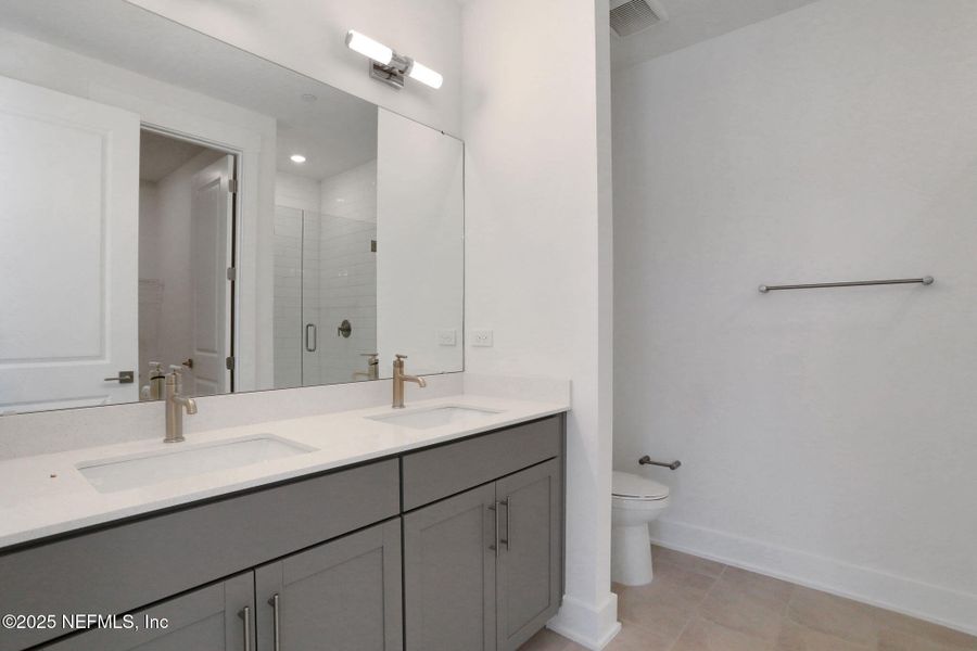 Furnished interior view inside a new home in North Beach Townhomes, Jacksonville Beach (Image 9).