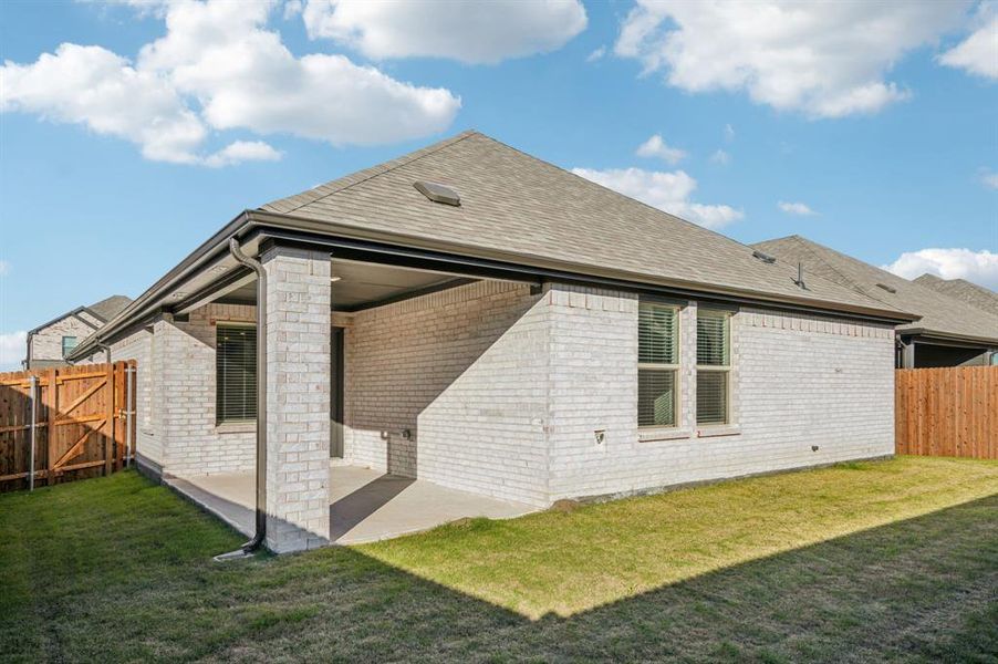 Exterior details and patio area of a home in , McKinney (Image 24).