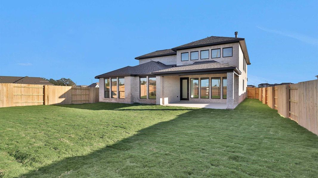 Exterior details and patio area of a home in Elyson 55', Katy (Image 3). Exterior details and patio area of a home in Elyson 55', Katy (Image 3).