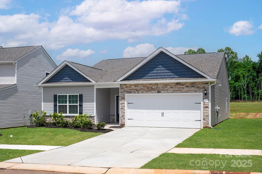 Front exterior of a new home in Ascot Woods, Charlotte, NC, highlighting curb appeal (Image 1).