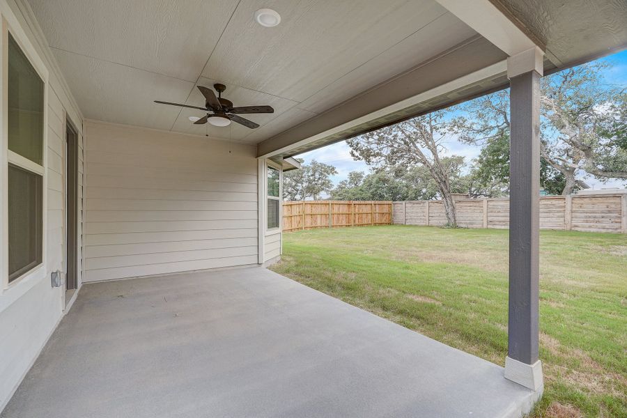 Covered patio of the Oleander floorplan at a Meritage Homes community.