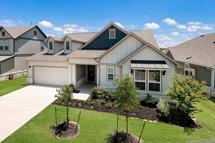Front exterior of a new home in The Crossvine, Schertz, TX, highlighting curb appeal (Image 24).
