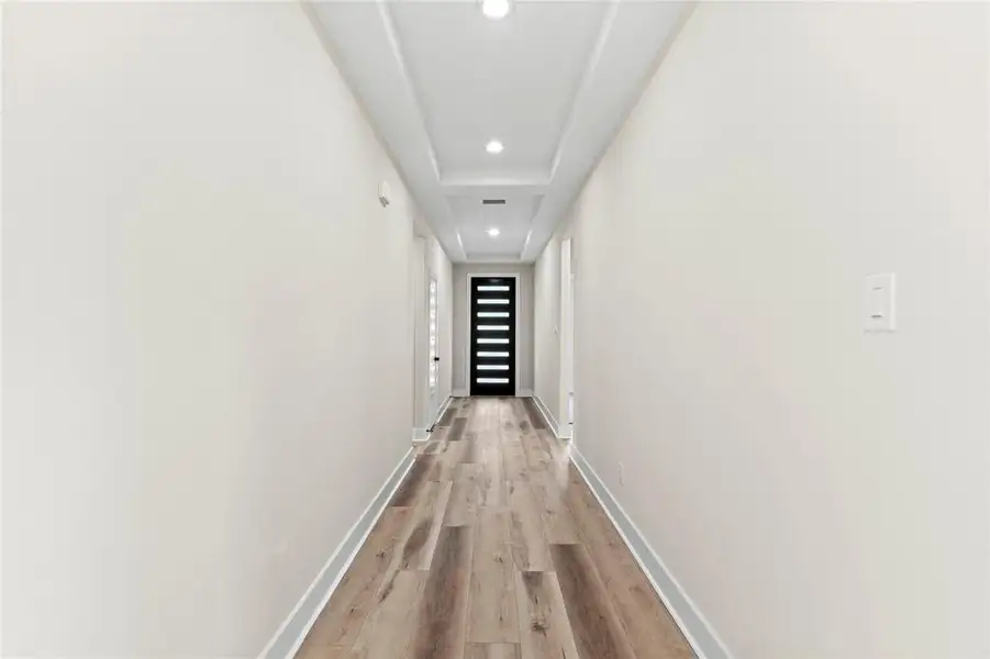 Hallway featuring light hardwood / wood-style floors