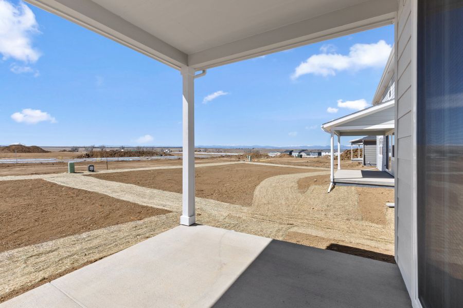 Exterior details and patio area of a home in The Estates Collection at Murphy Creek, Aurora (Image 3).
