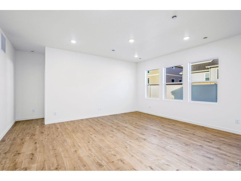 Spacious, unfurnished interior of a new home in Union Colony West, Greeley (Image 12).
