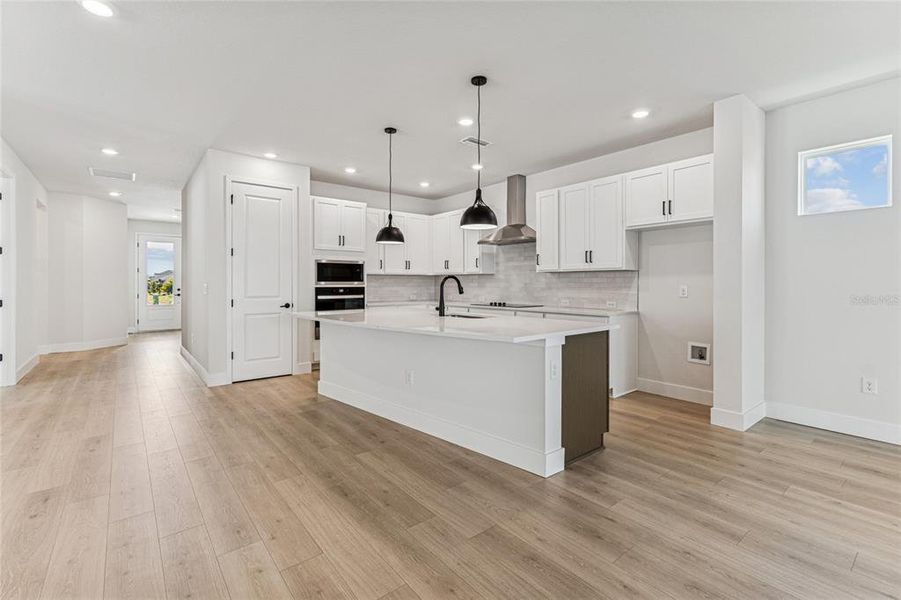 Furnished interior view inside a new home in North River Ranch - Cottage Series, Parrish (Image 8).