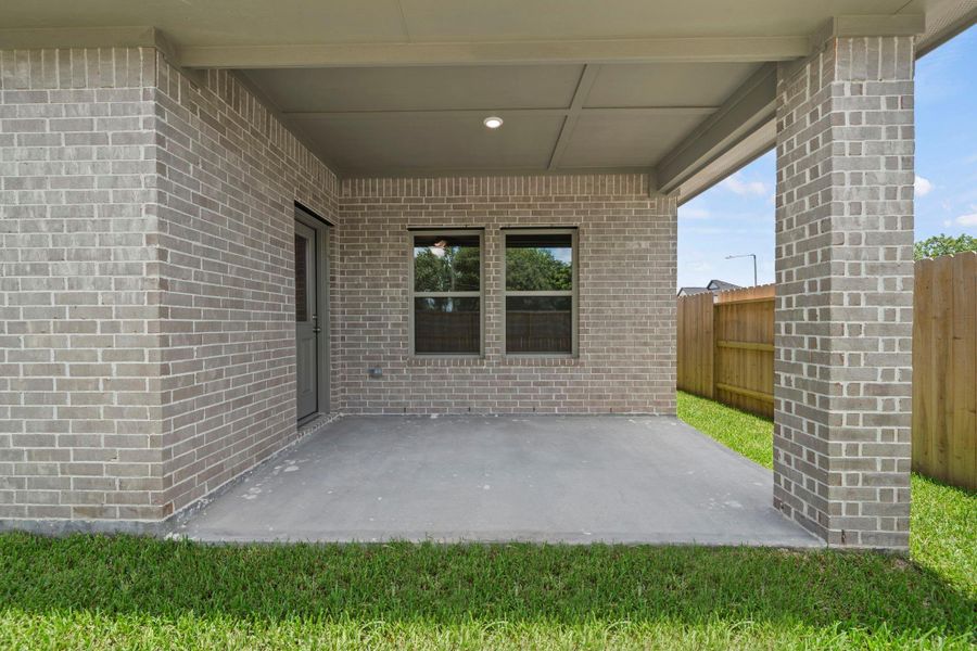 Exterior details and patio area of a home in Laurel Landing, Alvin (Image 4). Exterior details and patio area of a home in Laurel Landing, Alvin (Image 4).