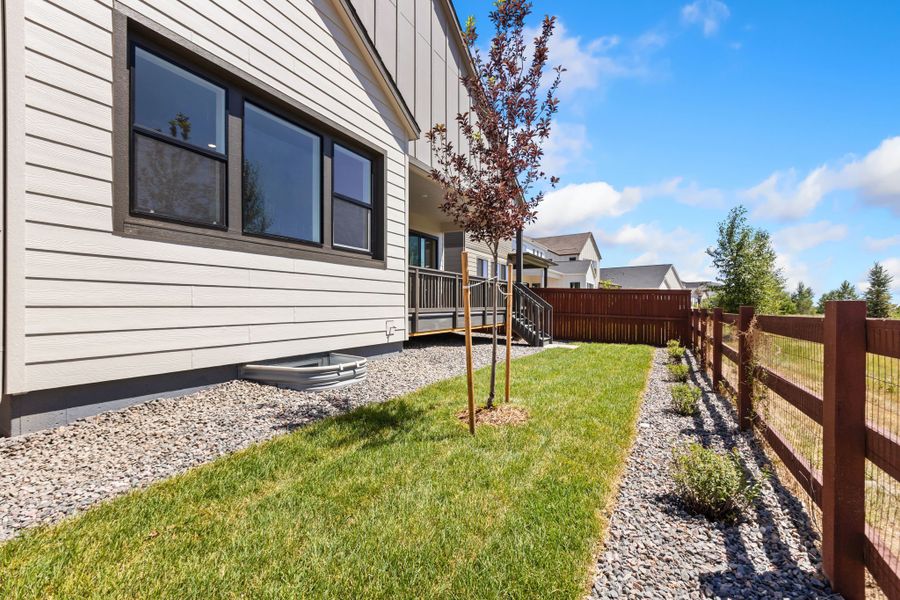 Exterior details and patio area of a home in RainDance, Windsor (Image 2). Exterior details and patio area of a home in RainDance, Windsor (Image 2).