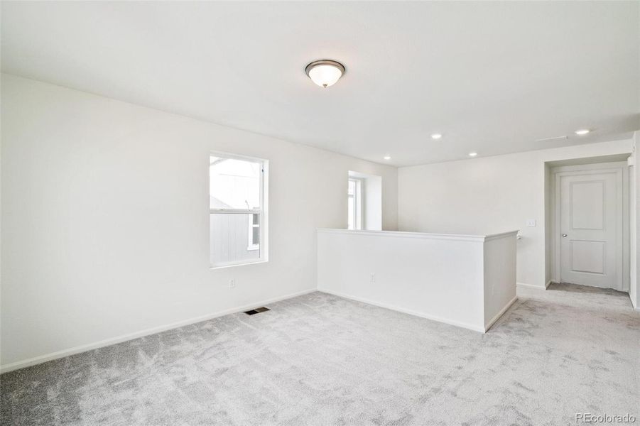 Spacious, unfurnished interior of a new home in Turnberry, Commerce City (Image 23).