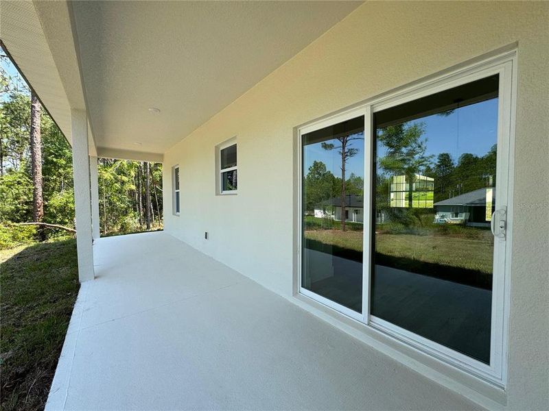 Exterior details and patio area of a home in , Citrus Springs (Image 20).
