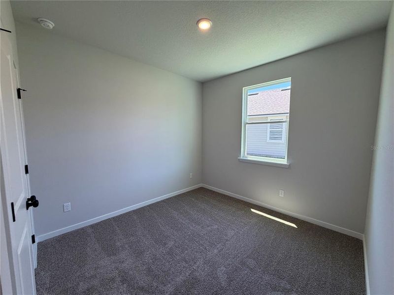 Spacious, unfurnished interior of a new home in Reserve East, Flagler Beach (Image 34).