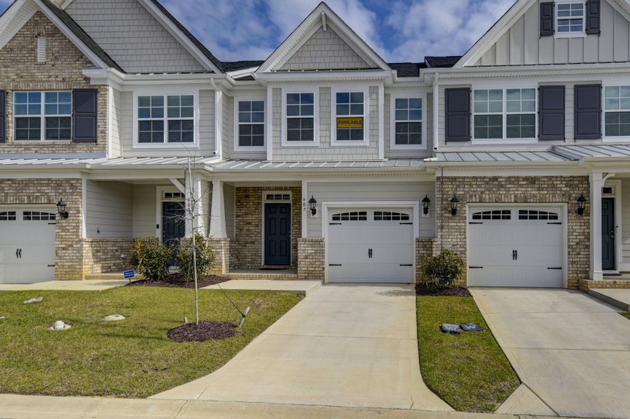 Front exterior of a new home in Lake Carolina Townhomes, Columbia, SC, highlighting curb appeal (Image 29).