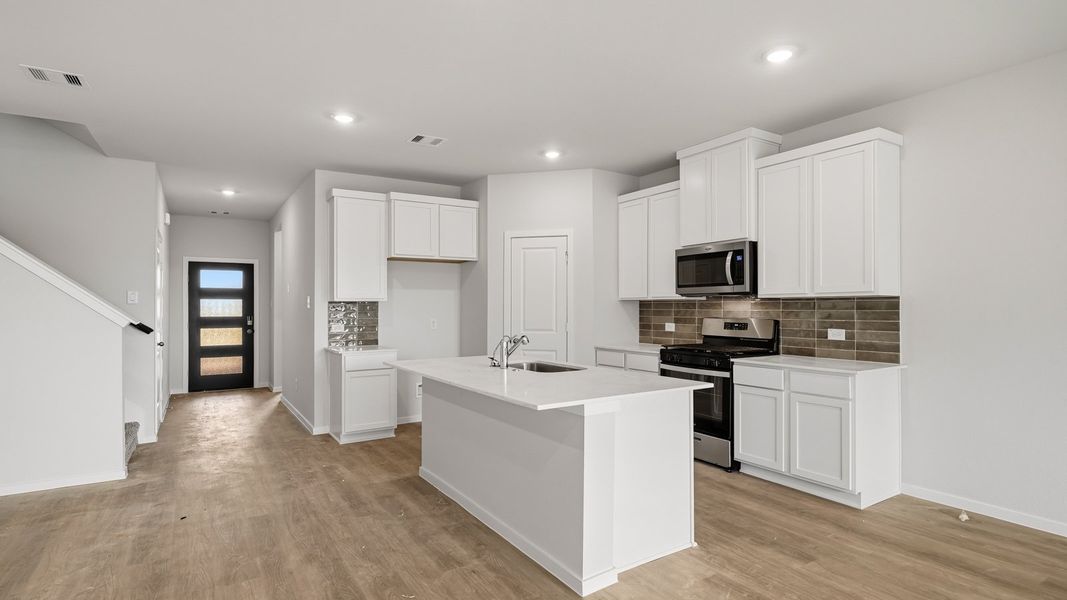 Furnished interior view inside a new home in Sunterra Lakes, Brookshire (Image 5).