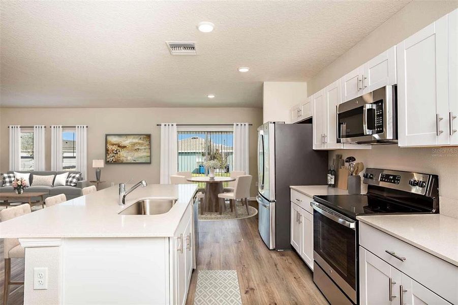 Furnished interior view inside a new home in Two Rivers, Zephyrhills (Image 8). Furnished interior view inside a new home in Two Rivers, Zephyrhills (Image 8).