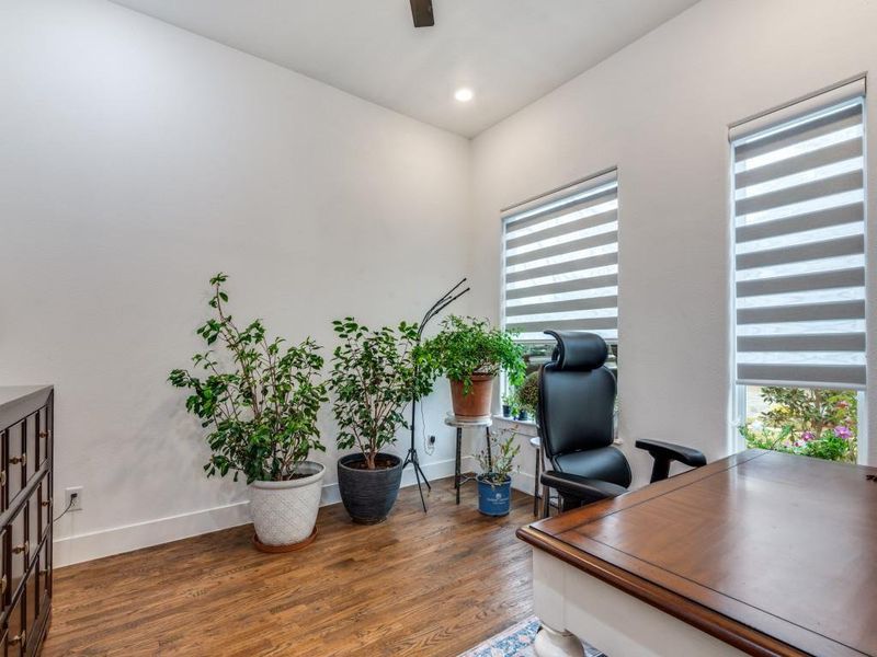 Office featuring dark wood finished floors and recessed lighting