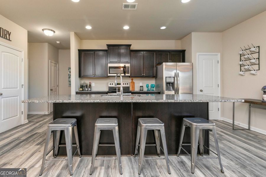 Furnished interior view inside a new home in Cobblestone Crossing Commons, Byron (Image 13).