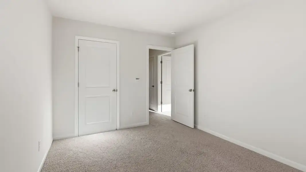 Spacious, unfurnished interior of a new home in Cedar Gap, Fountain Inn (Image 26). Spacious, unfurnished interior of a new home in Cedar Gap, Fountain Inn (Image 26).