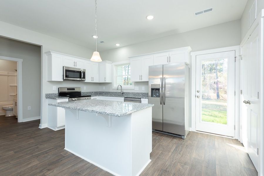 Representative furnished interior of a home built from the Lincoln by Foundation Home Builders LLC in Pinnix Loop, Burlington (Image 3).