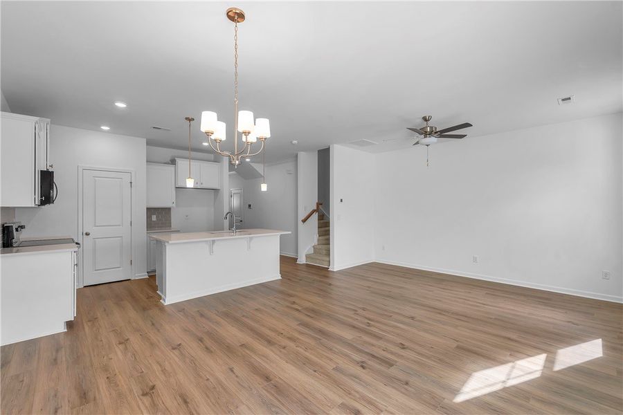 This bright, open-concept living space features wa This bright, open-concept living space features wa