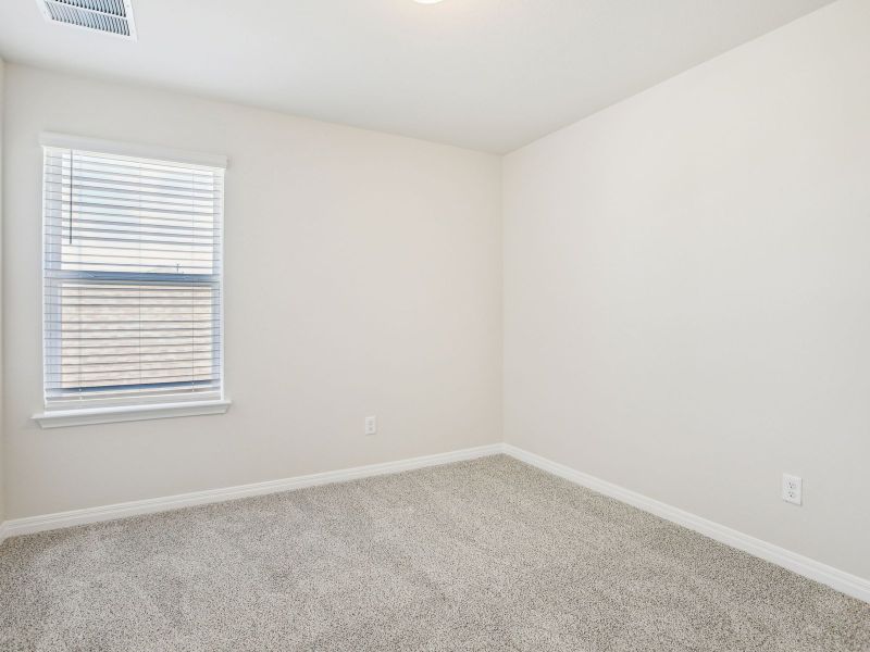 Spacious, unfurnished interior of a new home in Turner's Crossing - Reserve Collection, Buda (Image 13).