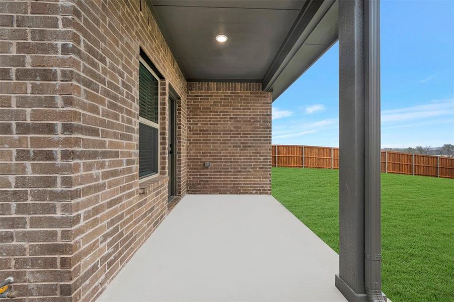 Exterior details and patio area of a home in Aspire at Reunion, Newark (Image 3).