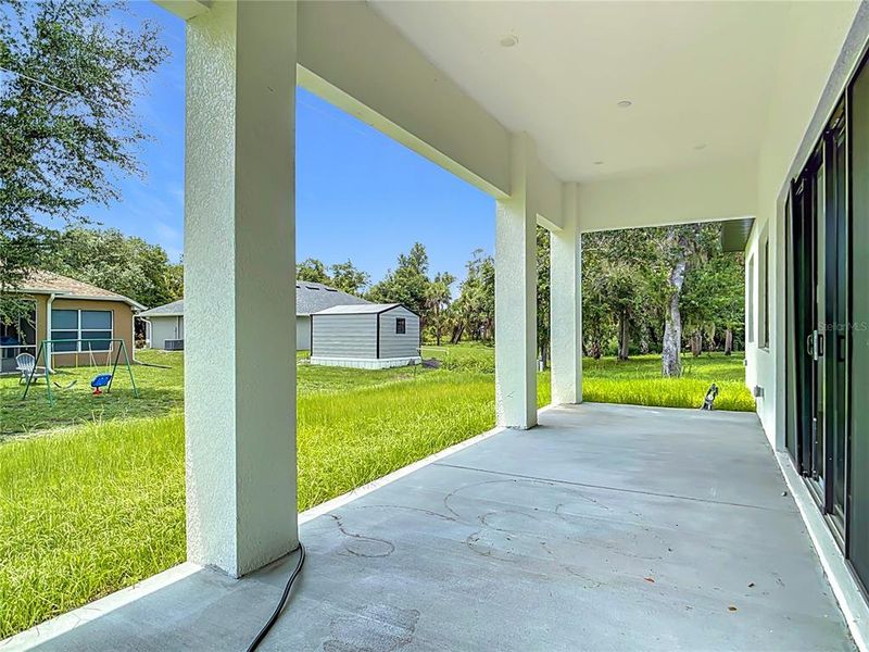 Exterior details and patio area of a home in , Port Charlotte (Image 3). Exterior details and patio area of a home in , Port Charlotte (Image 3).