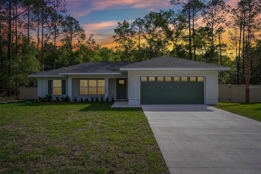 Front exterior of a new home in , Citrus Springs, FL, highlighting curb appeal (Image 26).