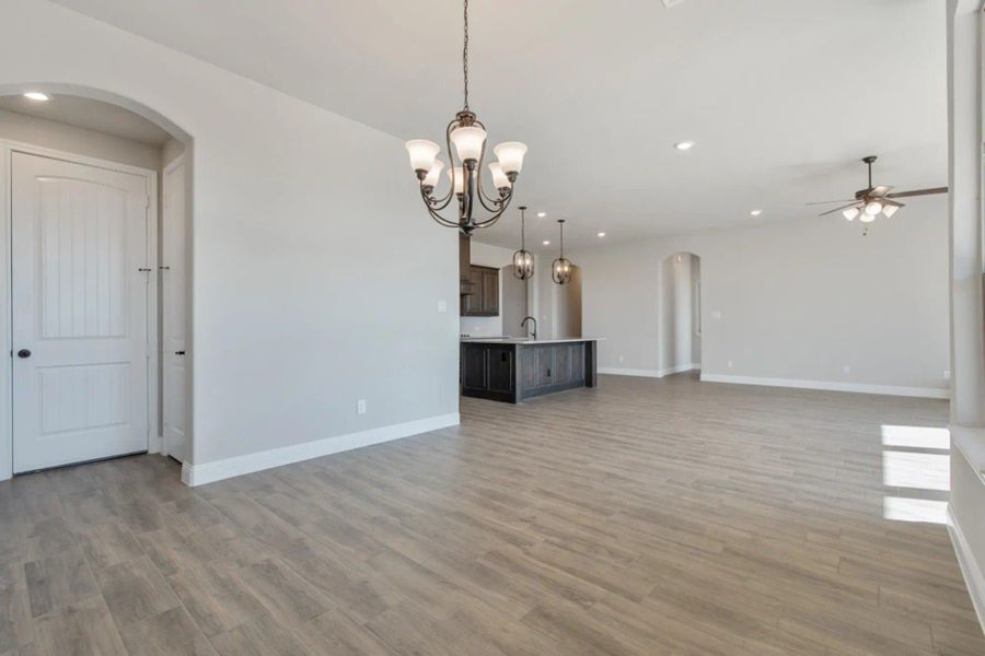 Nook & Family Room | Concept 2586 at Hidden Creek Estates in Van Alstyne, TX by Landsea Homes