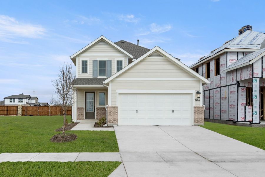 Front exterior of a new home in The Meadows, Denton, TX, highlighting curb appeal (Image 1). Front exterior of a new home in The Meadows, Denton, TX, highlighting curb appeal (Image 1).