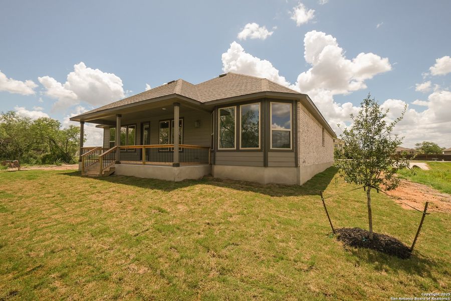 Front exterior of a new home in Everly Estates, San Antonio, TX, highlighting curb appeal (Image 15).