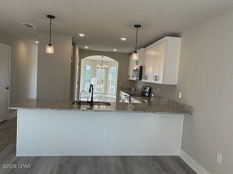 Furnished interior view inside a new home in College Station, Panama City (Image 3).