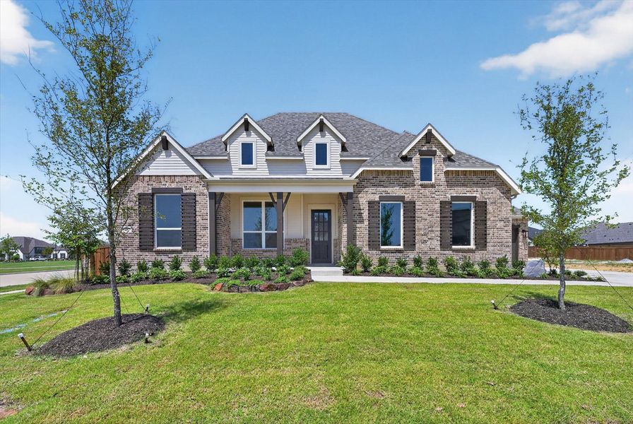 Front exterior of a new home in Canyon Creek Estates, Sherman, TX, highlighting curb appeal (Image 1). Front exterior of a new home in Canyon Creek Estates, Sherman, TX, highlighting curb appeal (Image 1).