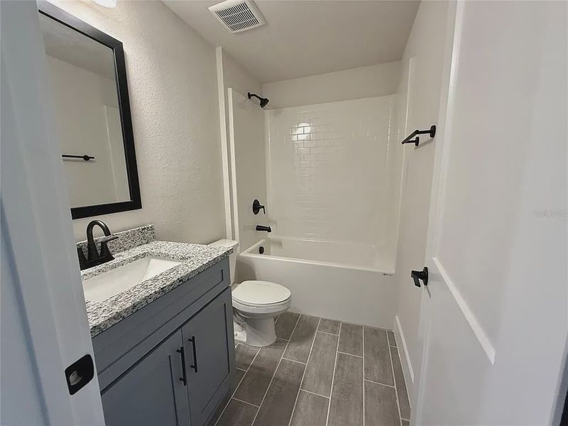 Furnished interior view inside a new home in South Gulf Cove, Port Charlotte (Image 13).