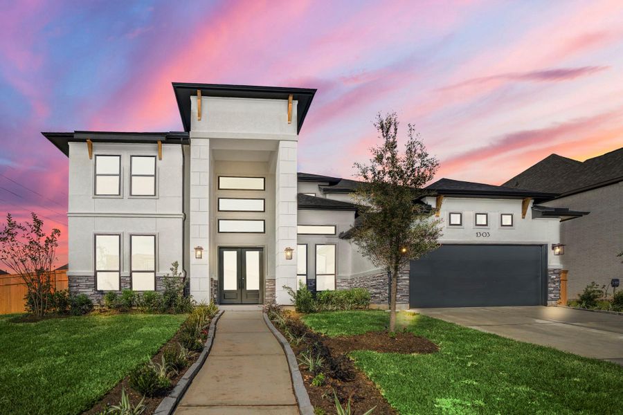Front exterior of a new home in Sienna 70′ Lots, Missouri City, TX, highlighting curb appeal (Image 2).
