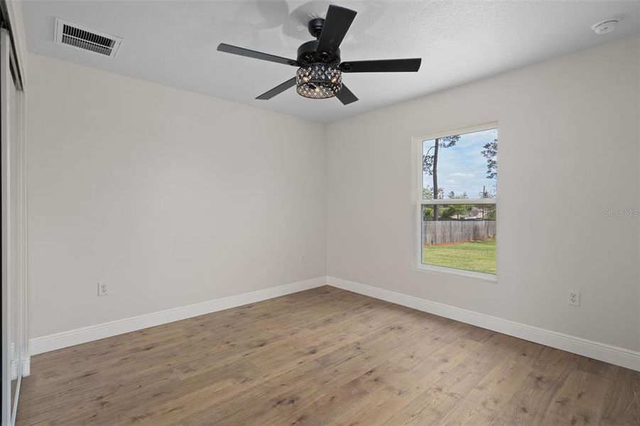 Spacious, unfurnished interior of a new home in , Weeki Wachee (Image 24).