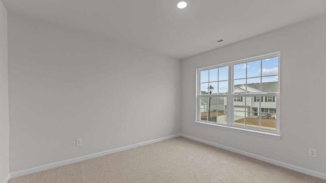 Spacious, unfurnished interior of a new home in Madeline Farm, New Bern (Image 27).