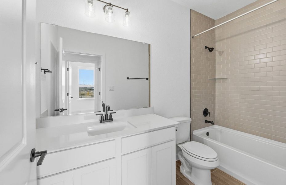 Furnished interior view inside a new home in Sunfield, Buda (Image 11).