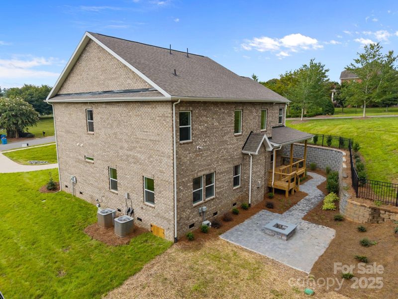 Front exterior of a new home in Stonebridge, Mint Hill, NC, highlighting curb appeal (Image 24). Front exterior of a new home in Stonebridge, Mint Hill, NC, highlighting curb appeal (Image 24).