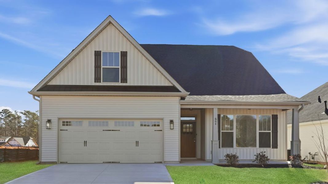 Front exterior of a new home in Arrowood Acres, Enoree, SC, highlighting curb appeal (Image 1). Front exterior of a new home in Arrowood Acres, Enoree, SC, highlighting curb appeal (Image 1).