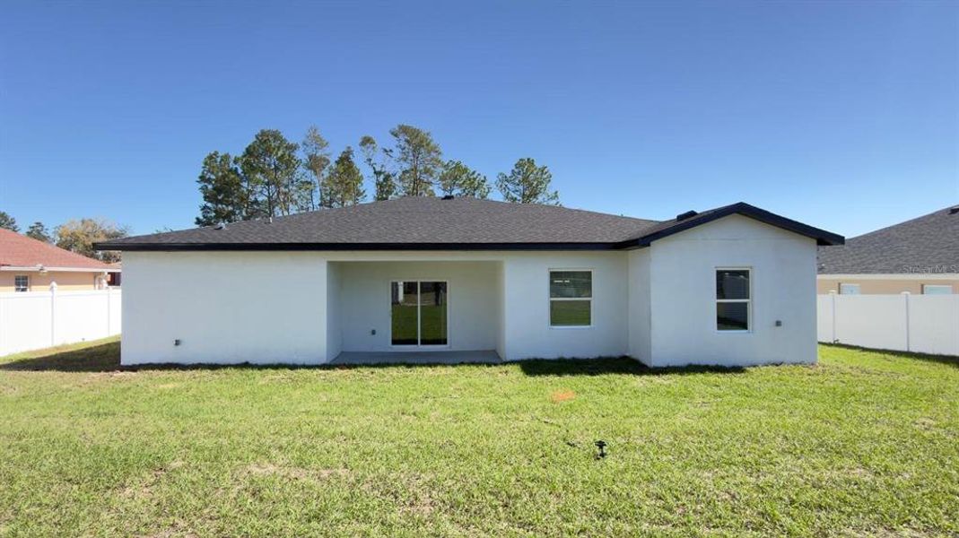 Exterior details and patio area of a home in , Ocala (Image 22).