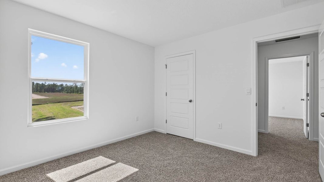 Representative unfurnished interior of a home built from the Robie by D.R. Horton in Copes Landing, Jacksonville (Image 27).