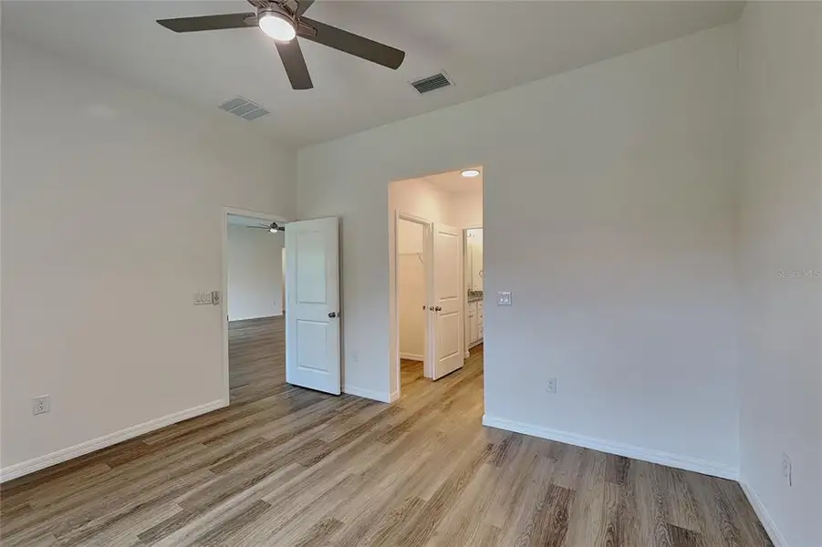 Spacious, unfurnished interior of a new home in , Port Charlotte (Image 10).