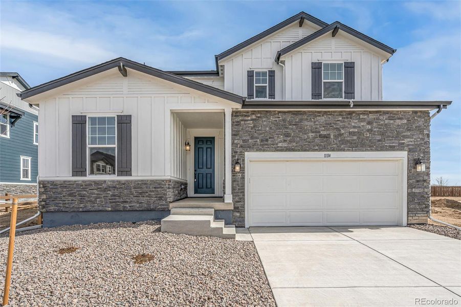 Front exterior of a new home in , Commerce City, CO, highlighting curb appeal (Image 23).